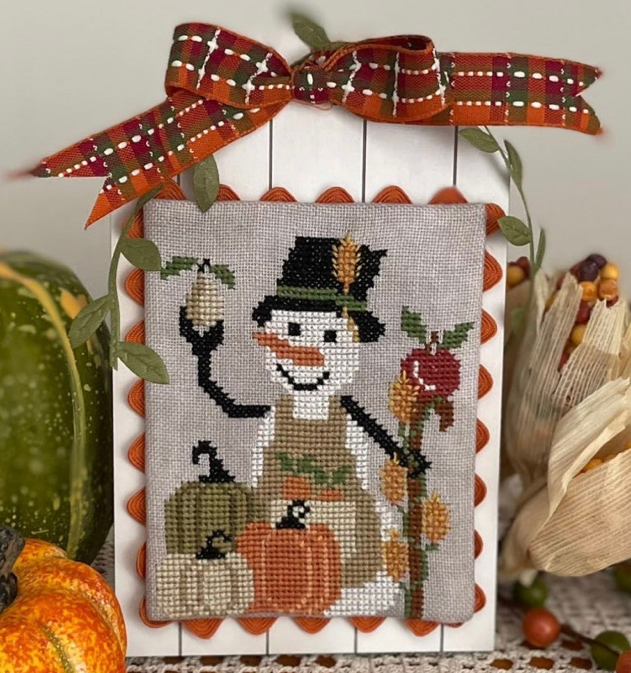 The Pumpkins’ Snowman
- Mani Di Donna - 2026 Needlework Marketplace PREORDER